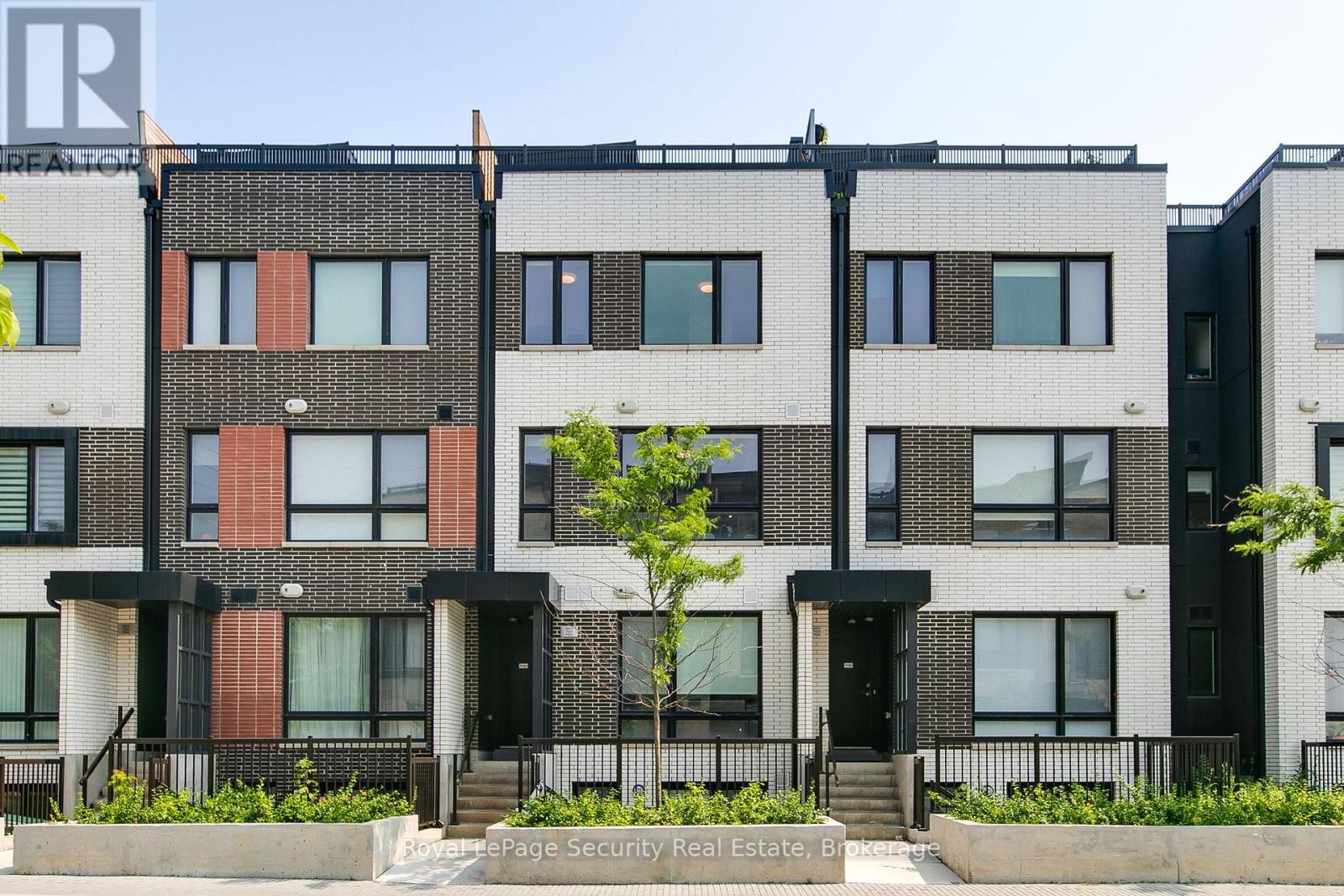 Th 22 - 40 Ed Clark Gardens, Toronto, Ontario  M6N 0B5 - Photo 3 - W12485286