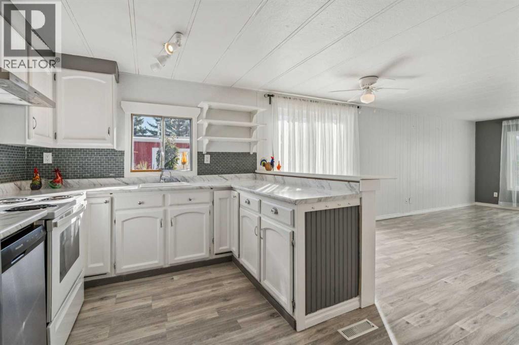 12 Spring Haven Road Se, Airdrie, Alberta  T4A 1E2 - Photo 5 - A2264810