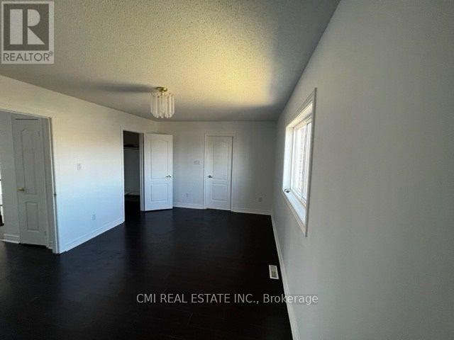 85 Watkins Glen Crescent, Aurora, Ontario  L4G 7P4 - Photo 3 - N12485340