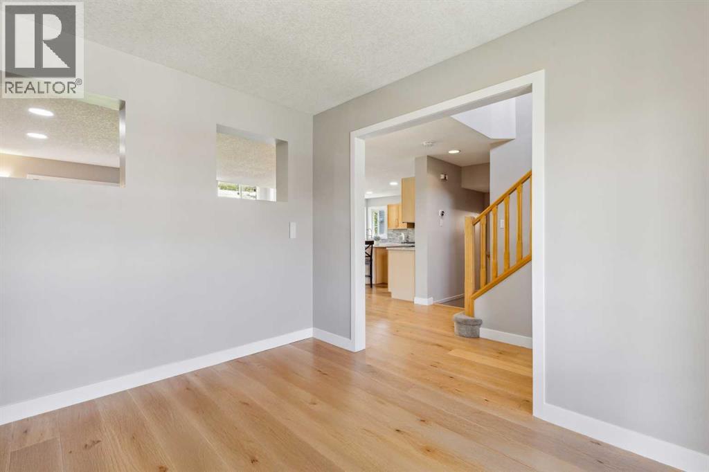 7728 Springbank Way Sw, Calgary, Alberta  T3H 4L8 - Photo 4 - A2249079