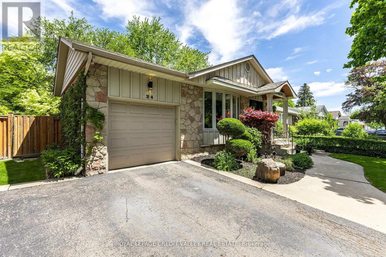 24 Ladore Drive, Brampton, Ontario  L6Y 1V5 - Photo 2 - W12485400