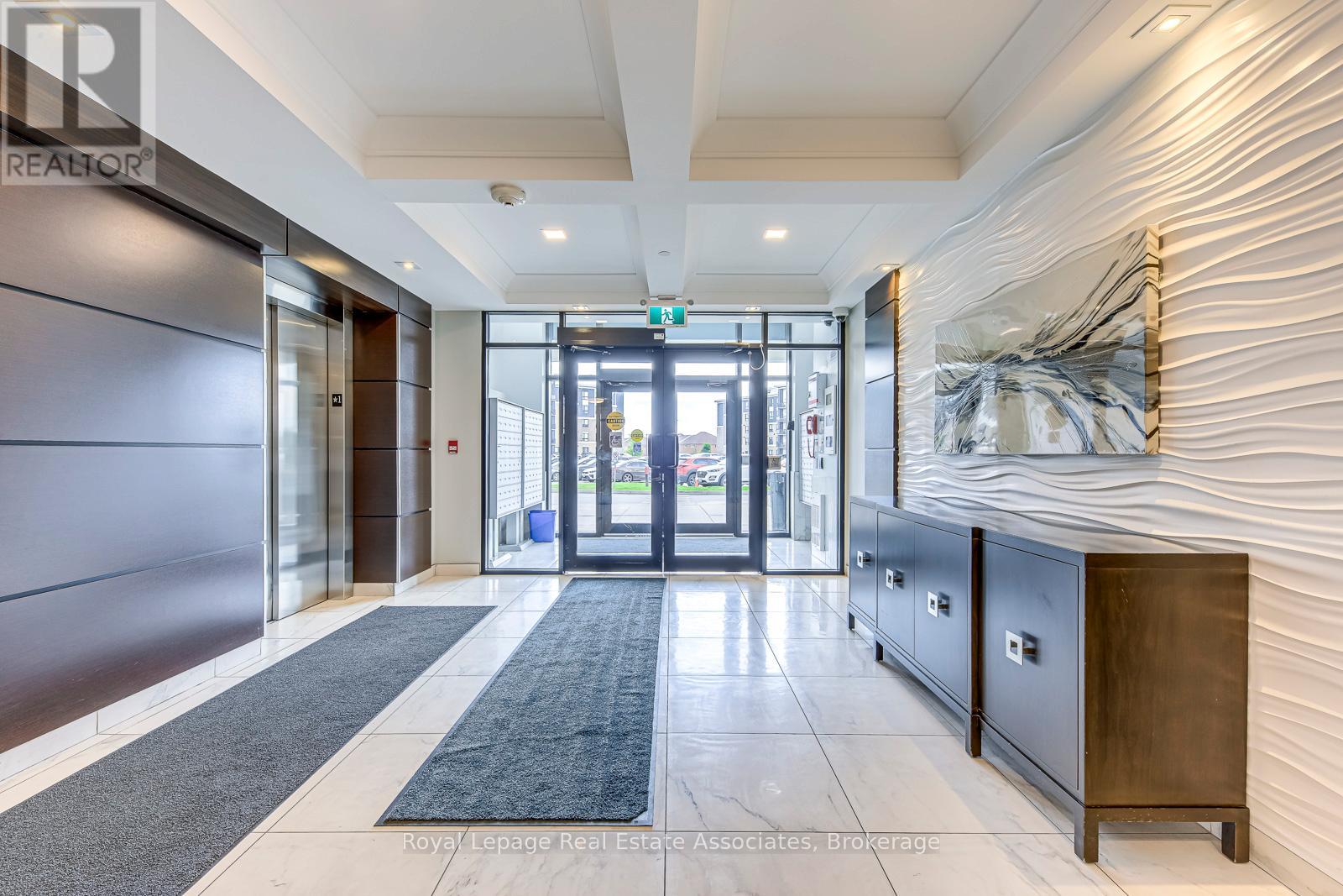 309 - 630 Sauve Street, Milton, Ontario  L9T 9A6 - Photo 2 - W12402223