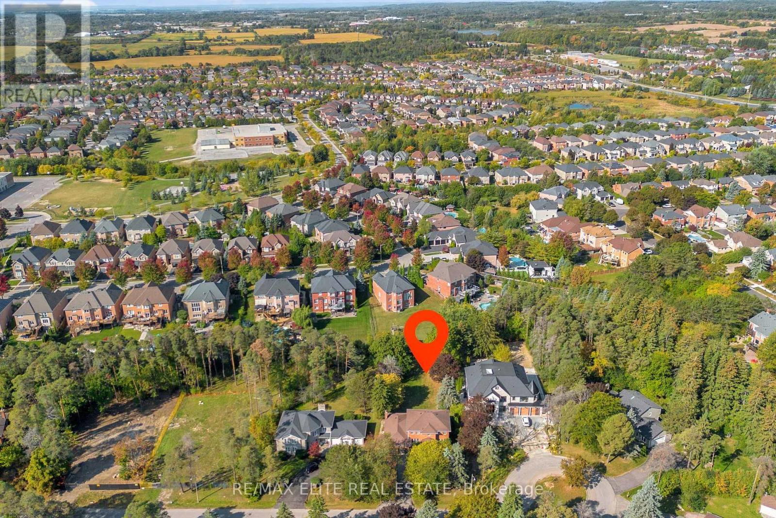 61 Beaufort Hills Road, Richmond Hill (Oak Ridges), Ontario  L4E 2N3 - Photo 31 - N12421130