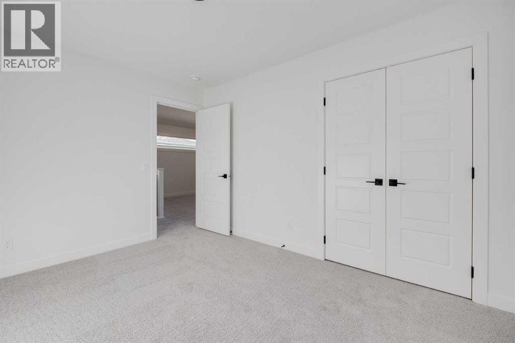 138 Northern Lights Crescent, Langdon, Alberta  T0J 1X2 - Photo 28 - A2264938