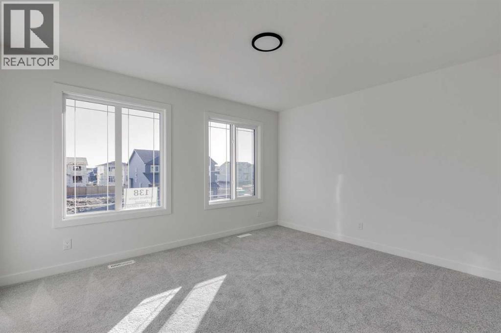 138 Northern Lights Crescent, Langdon, Alberta  T0J 1X2 - Photo 19 - A2264938