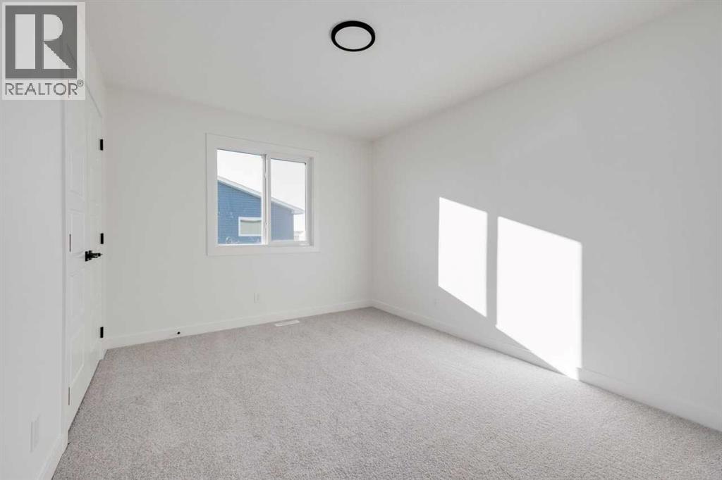 138 Northern Lights Crescent, Langdon, Alberta  T0J 1X2 - Photo 27 - A2264938