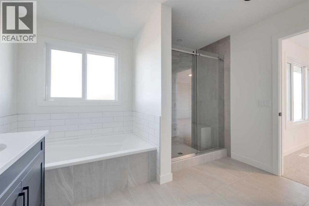 138 Northern Lights Crescent, Langdon, Alberta  T0J 1X2 - Photo 34 - A2264938