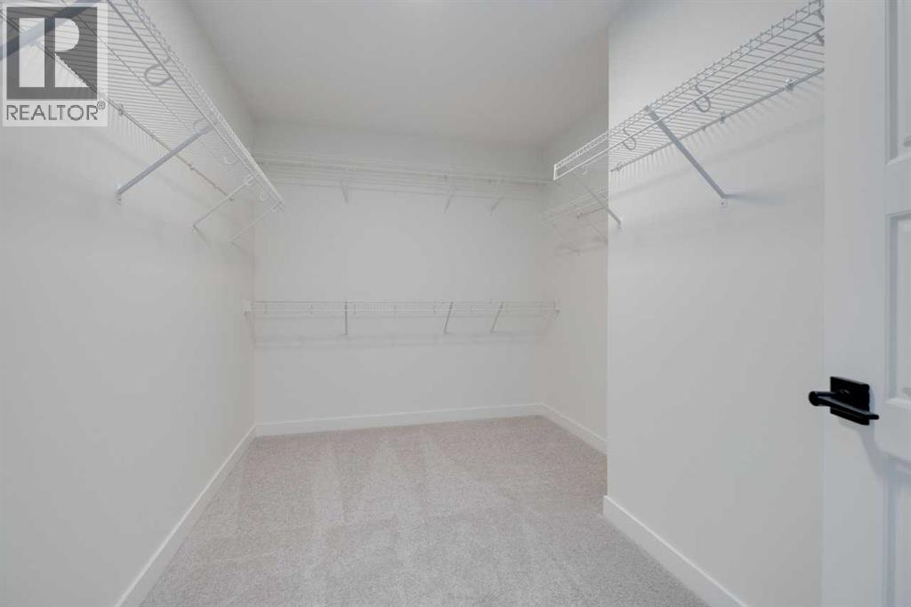 138 Northern Lights Crescent, Langdon, Alberta  T0J 1X2 - Photo 31 - A2264938