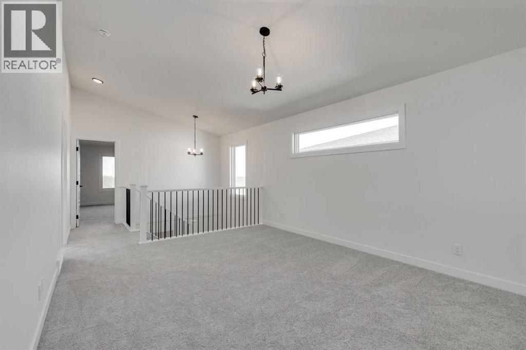 138 Northern Lights Crescent, Langdon, Alberta  T0J 1X2 - Photo 17 - A2264938