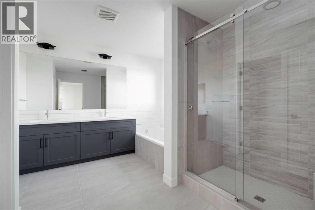 138 Northern Lights Crescent, Langdon, Alberta  T0J 1X2 - Photo 32 - A2264938