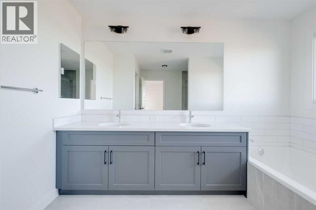 138 Northern Lights Crescent, Langdon, Alberta  T0J 1X2 - Photo 33 - A2264938