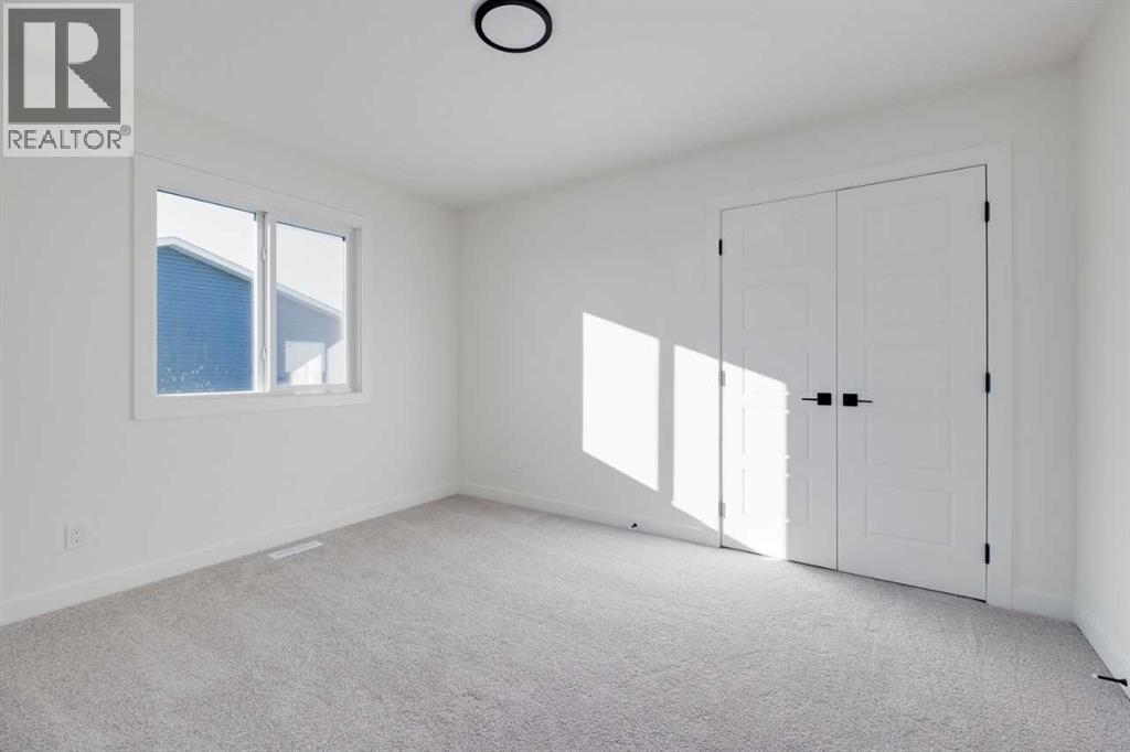 138 Northern Lights Crescent, Langdon, Alberta  T0J 1X2 - Photo 25 - A2264938