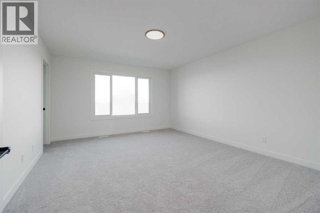 138 Northern Lights Crescent, Langdon, Alberta  T0J 1X2 - Photo 29 - A2264938