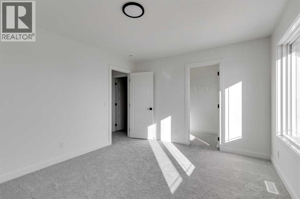 138 Northern Lights Crescent, Langdon, Alberta  T0J 1X2 - Photo 20 - A2264938