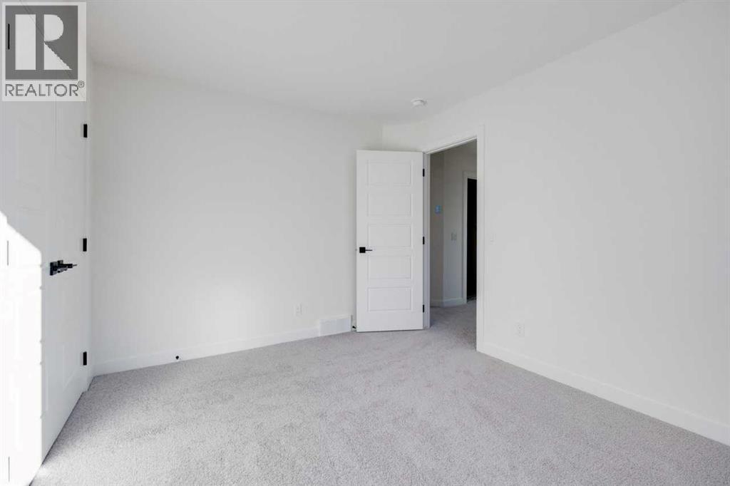 138 Northern Lights Crescent, Langdon, Alberta  T0J 1X2 - Photo 26 - A2264938