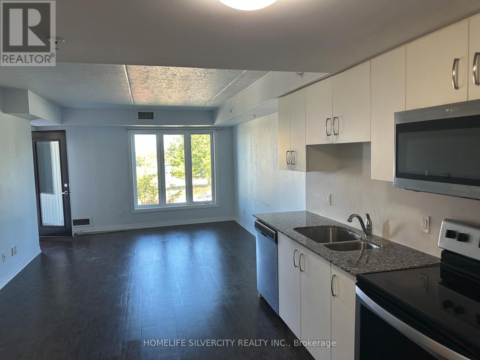 206 - 104 Summit Ridge Drive, Guelph, Ontario  N1E 0R5 - Photo 2 - X12485603