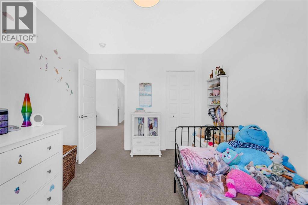 18 Wolf Creek Rise Se, Calgary, Alberta  T2X 4Y9 - Photo 23 - A2261527