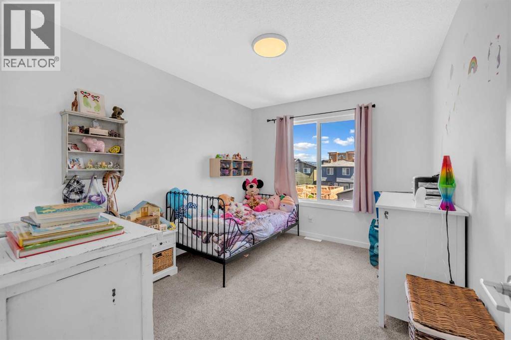 18 Wolf Creek Rise Se, Calgary, Alberta  T2X 4Y9 - Photo 22 - A2261527