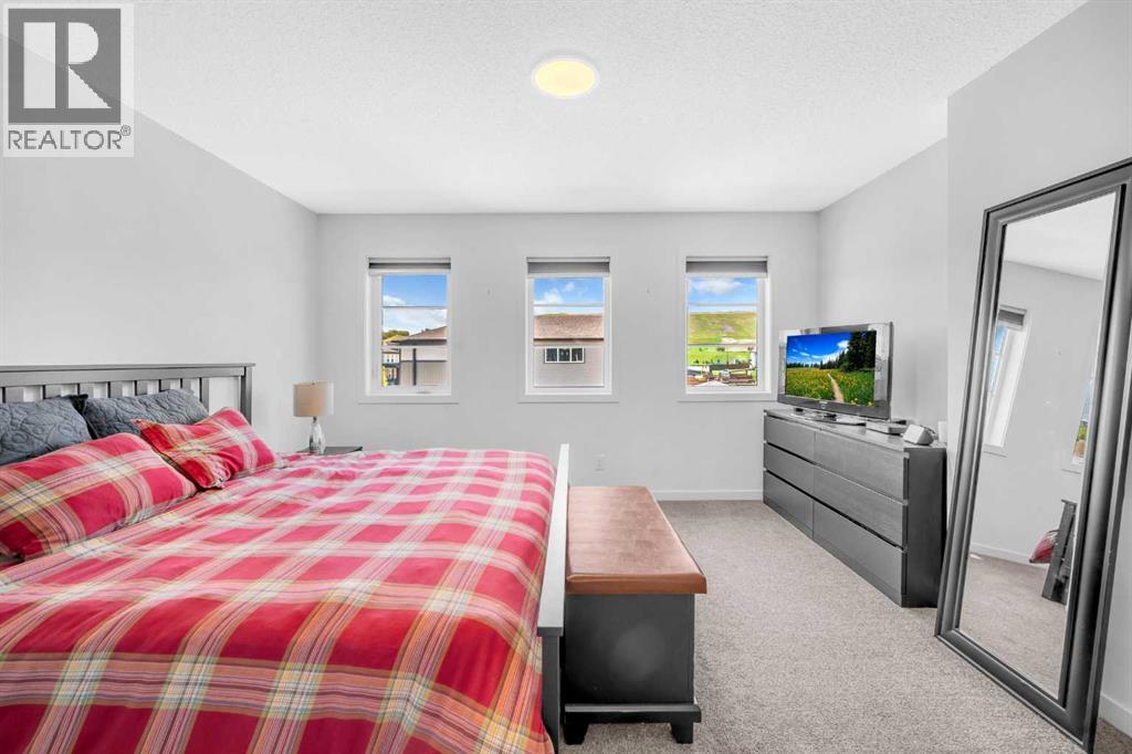 18 Wolf Creek Rise Se, Calgary, Alberta  T2X 4Y9 - Photo 31 - A2261527