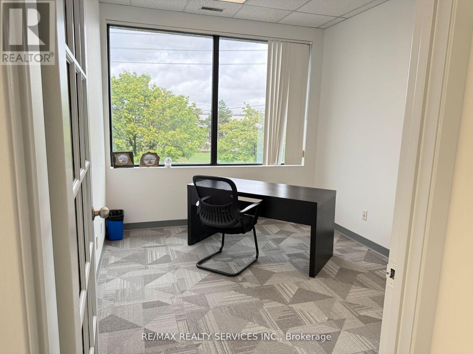 217 - 6705 Tomken Rd Road, Mississauga, Ontario  L5T 2J6 - Photo 3 - W12485891