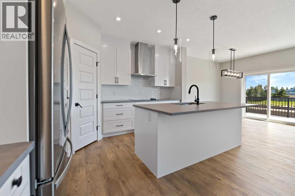 71 Saddlebred Place, Cochrane, Alberta  T4C 3E7 - Photo 5 - A2238697