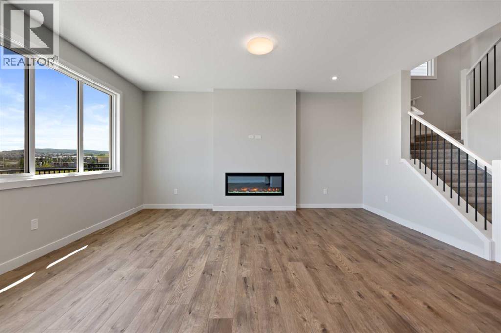 71 Saddlebred Place, Cochrane, Alberta  T4C 3E7 - Photo 9 - A2238697