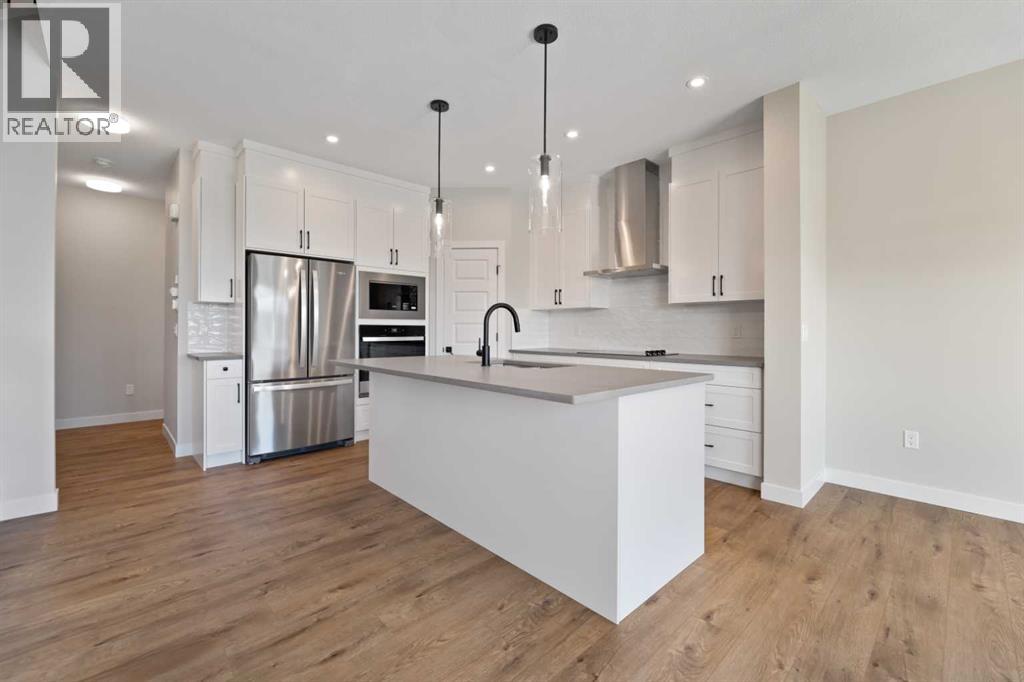 71 Saddlebred Place, Cochrane, Alberta  T4C 3E7 - Photo 6 - A2238697