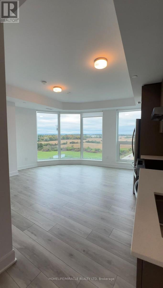 1009 - 3240 William Coltson Avenue, Oakville, Ontario  L6H 8C8 - Photo 3 - W12467207