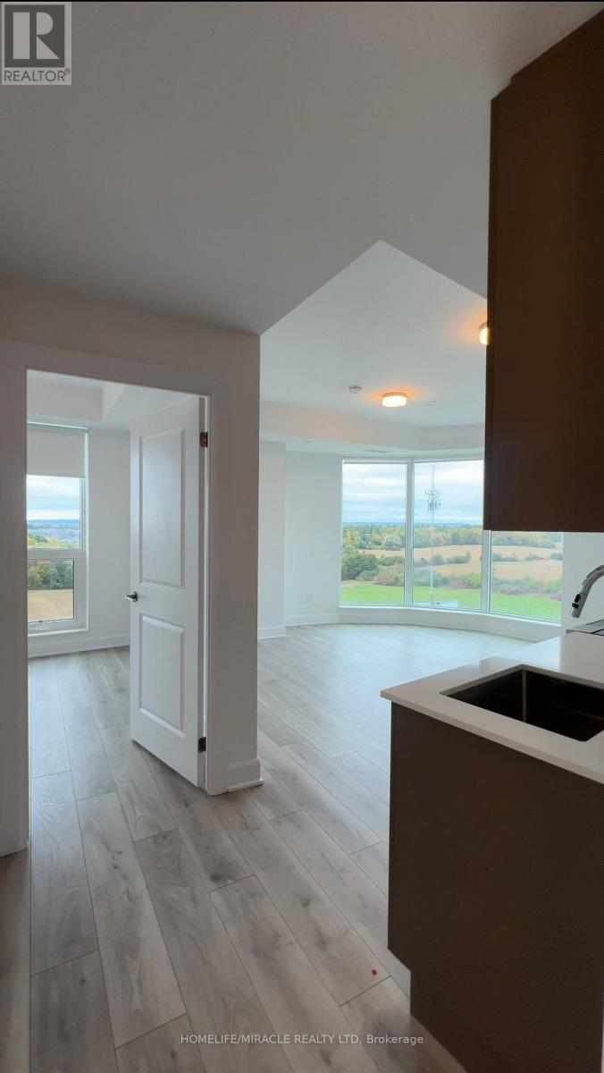 1009 - 3240 William Coltson Avenue, Oakville, Ontario  L6H 8C8 - Photo 4 - W12467207