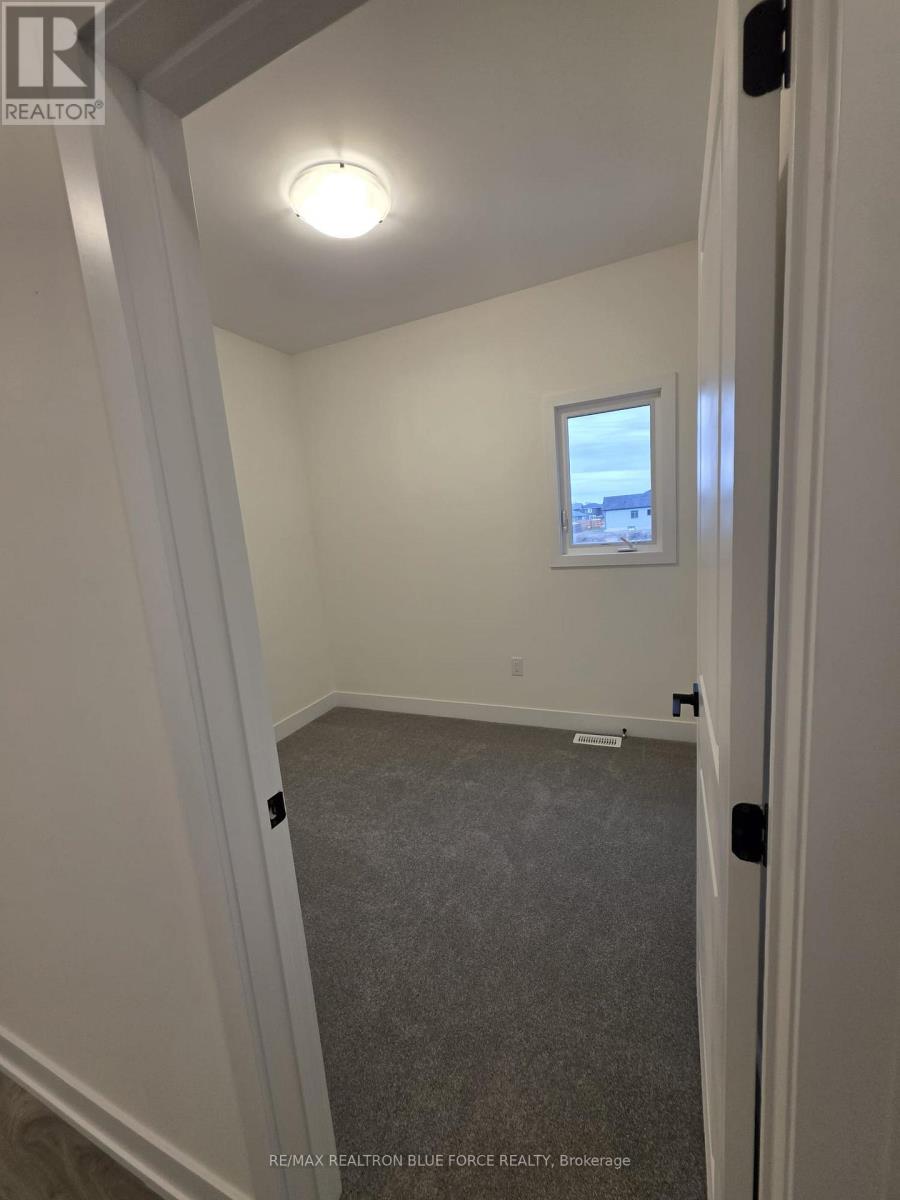 55 Dusenbury Drive, Loyalist, Ontario  K0H 2H0 - Photo 10 - X12485986