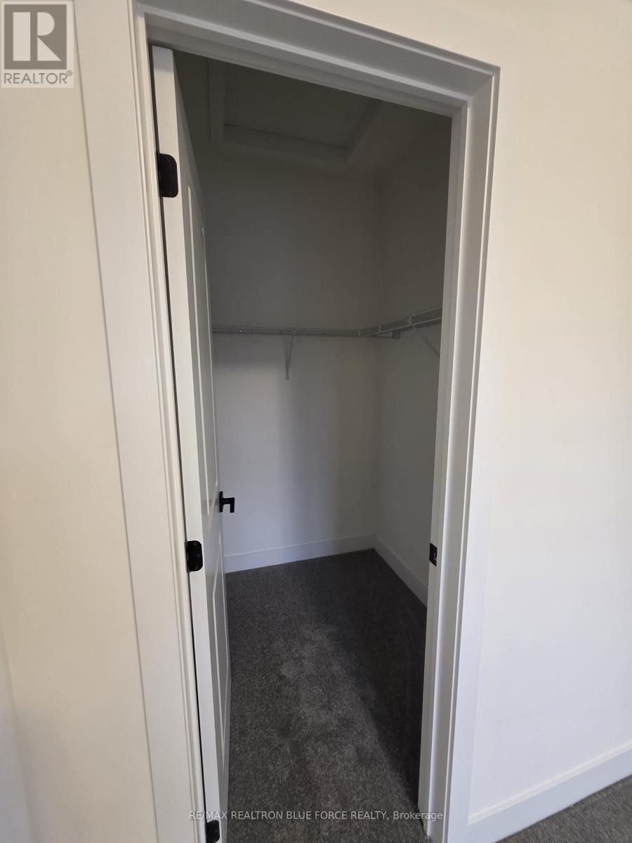 55 Dusenbury Drive, Loyalist, Ontario  K0H 2H0 - Photo 13 - X12485986