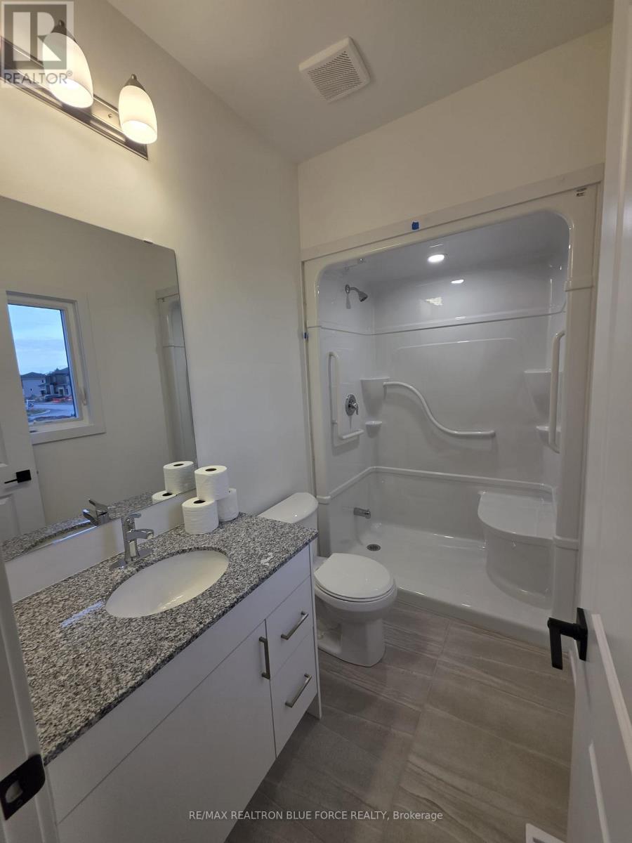 55 Dusenbury Drive, Loyalist, Ontario  K0H 2H0 - Photo 17 - X12485986