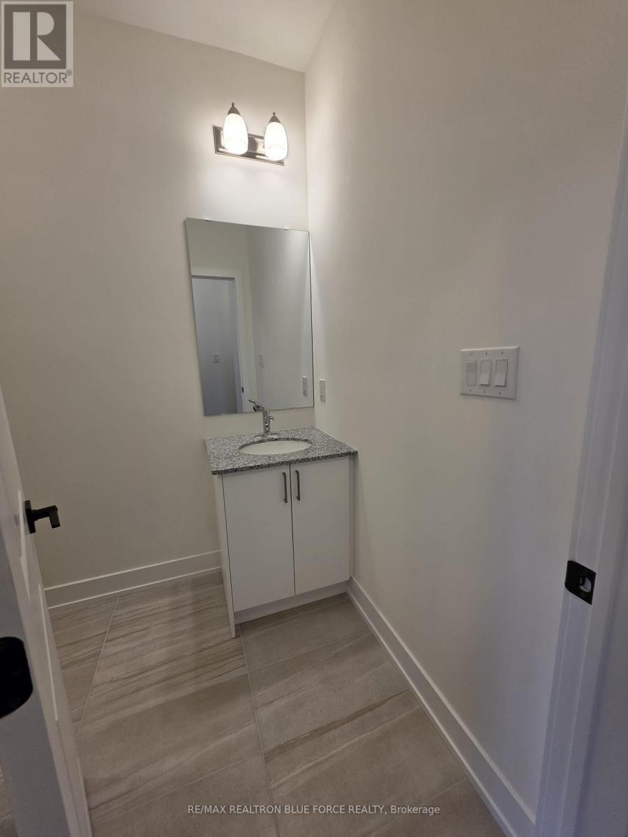 55 Dusenbury Drive, Loyalist, Ontario  K0H 2H0 - Photo 18 - X12485986