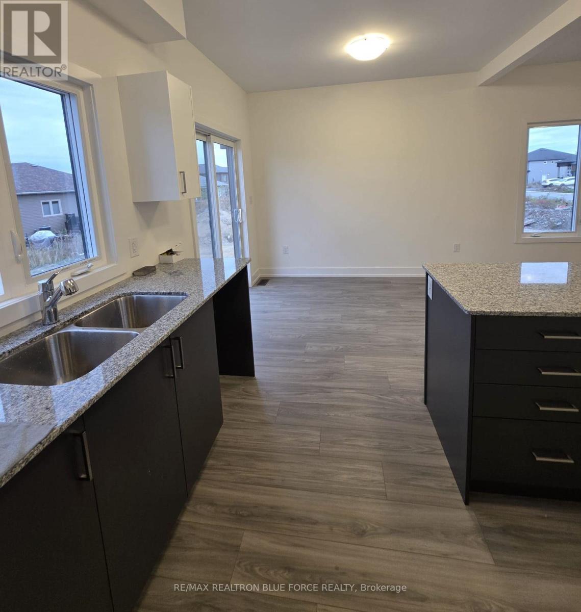 55 Dusenbury Drive, Loyalist, Ontario  K0H 2H0 - Photo 4 - X12485986