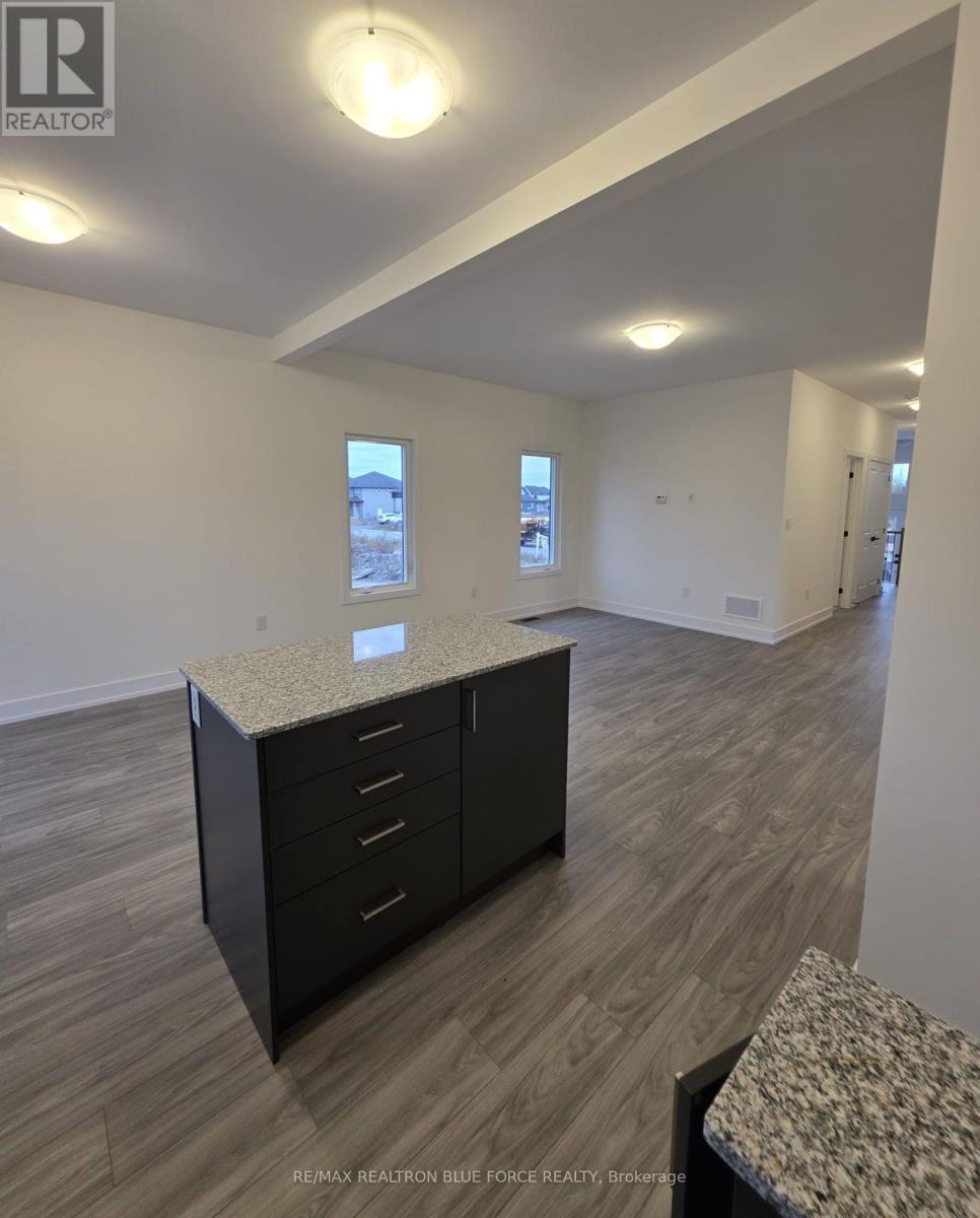 55 Dusenbury Drive, Loyalist, Ontario  K0H 2H0 - Photo 6 - X12485986