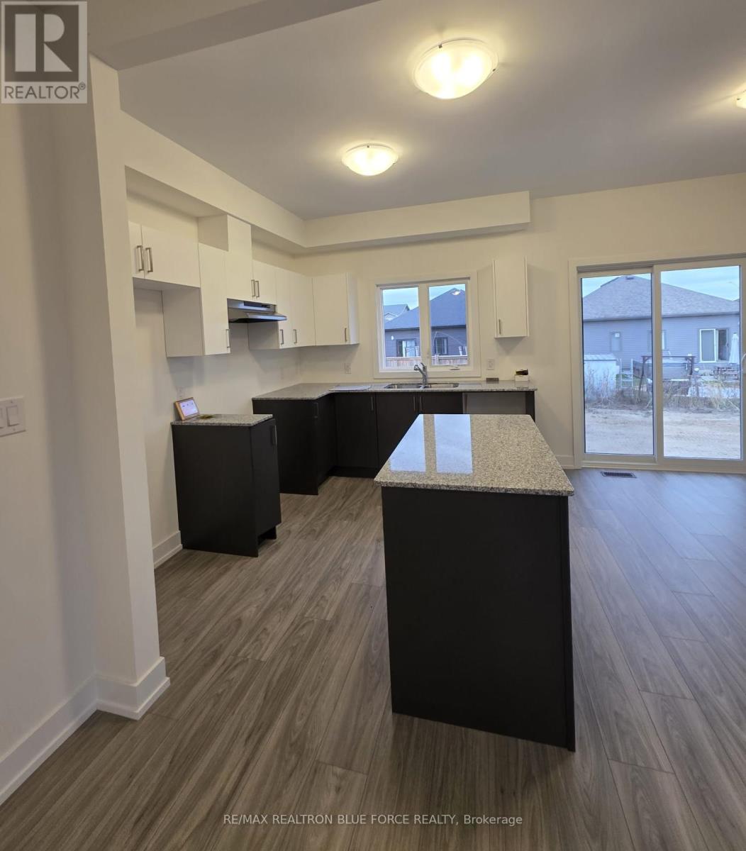 55 Dusenbury Drive, Loyalist, Ontario  K0H 2H0 - Photo 8 - X12485986