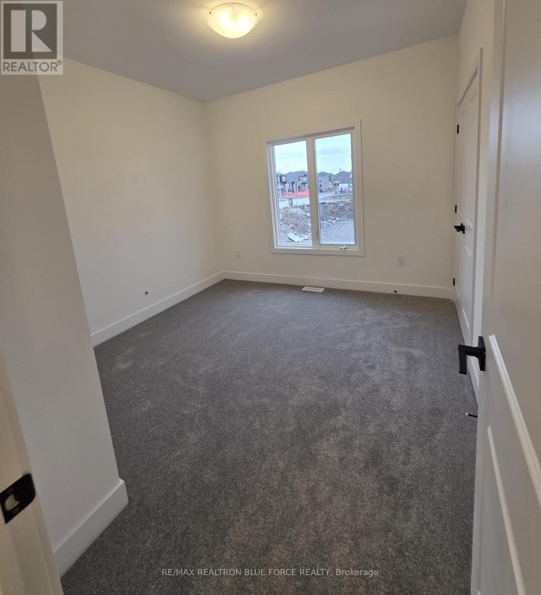 55 Dusenbury Drive, Loyalist, Ontario  K0H 2H0 - Photo 9 - X12485986