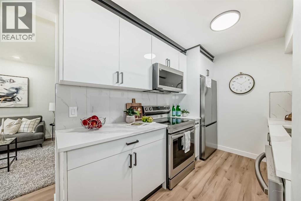 404, 544 Blackthorn Road Ne, Calgary, Alberta  T2K 5J5 - Photo 3 - A2264744