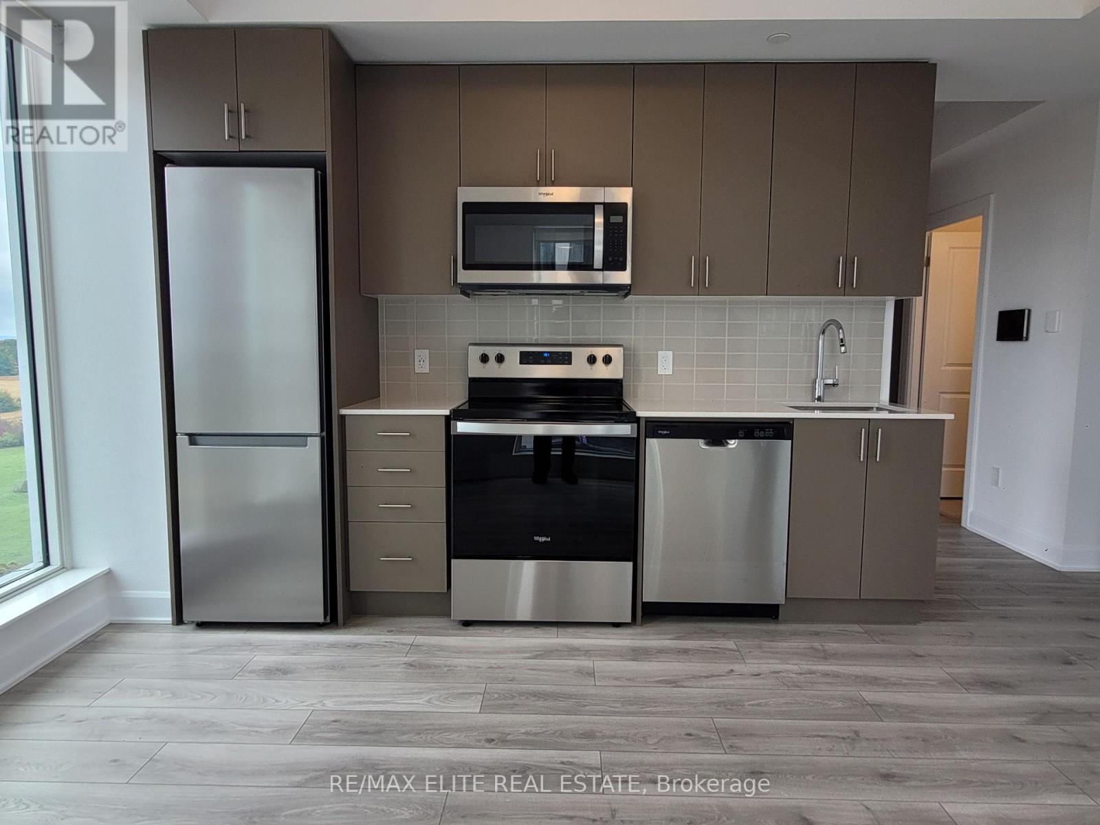 1104 - 3240 William Coltson Avenue, Oakville, Ontario  L6H 8C8 - Photo 4 - W12486072