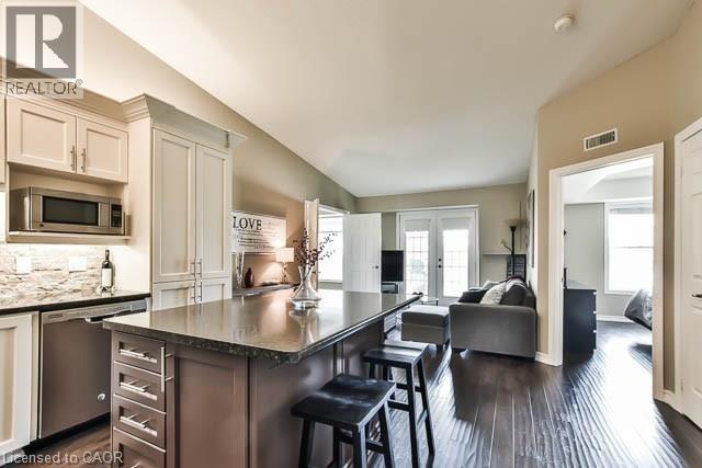 1441 Walker's Line Unit# 409, Burlington, Ontario  L7M 4P2 - Photo 2 - 40782273