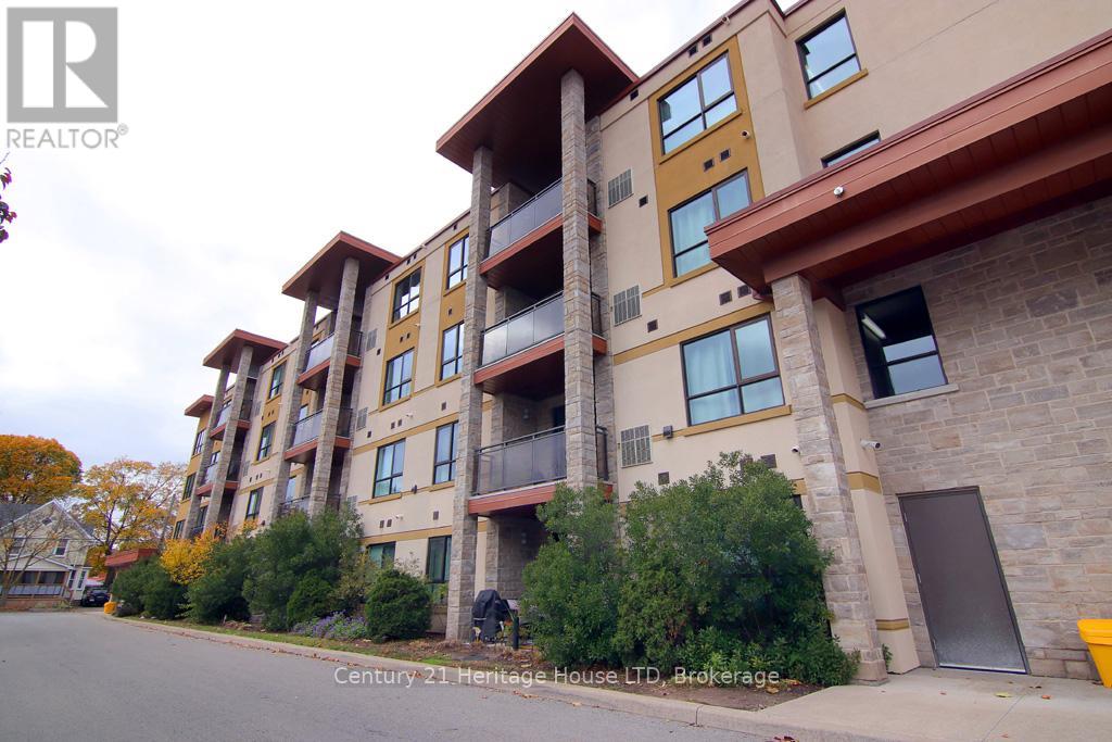 404 - 26 Wellington Street, St. Catharines (Downtown), Ontario  L2R 5P8 - Photo 1 - X12486194