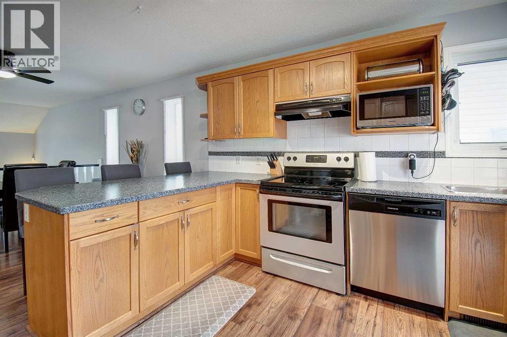 1047 Creek Springs Rise Nw, Airdrie, Alberta  T4B 2V5 - Photo 9 - A2261820