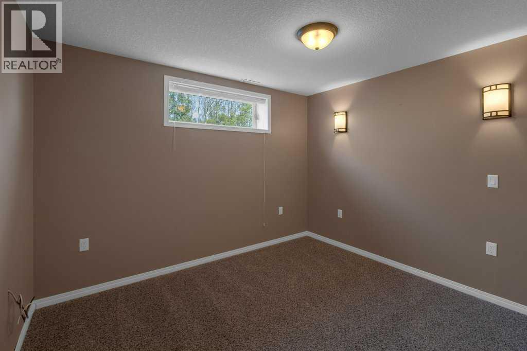 129 Covenant Bay, Rural Rocky View County, Alberta  T1X 1G2 - Photo 23 - A2261931