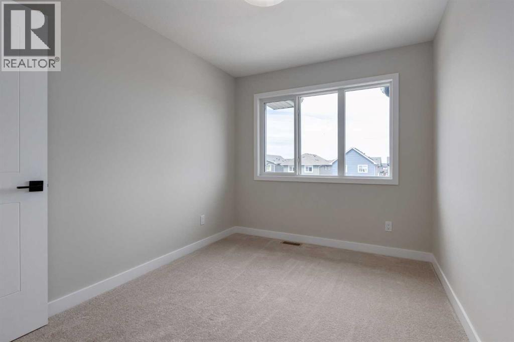 405 Clydesdale Avenue, Cochrane, Alberta  T4C 3L8 - Photo 37 - A2264579