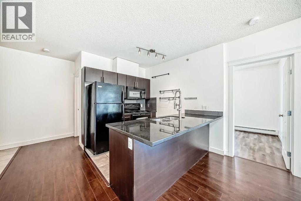 705, 315 3 Street Se, Calgary, Alberta T2G 0S3 - Photo 4 - A2258840