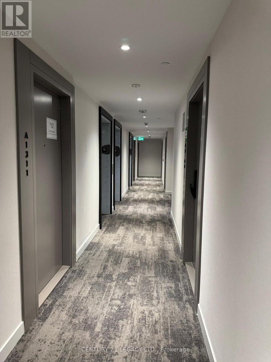 1310 - 3079 Trafalgar Rd Road, Oakville, Ontario  L6H 8C5 - Photo 5 - W12486674