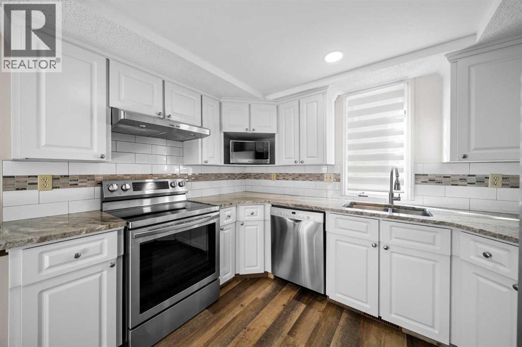 36 Strathlorne Crescent Sw, Calgary, Alberta  T3H 1M8 - Photo 13 - A2261749