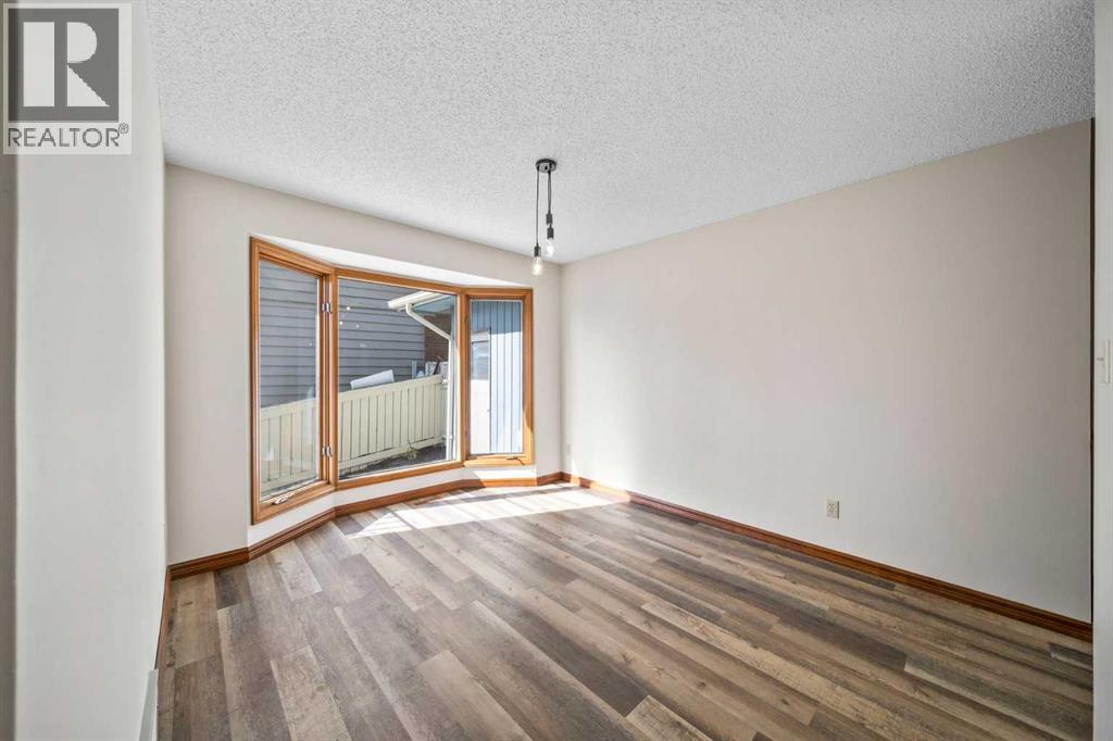 36 Strathlorne Crescent Sw, Calgary, Alberta  T3H 1M8 - Photo 9 - A2261749