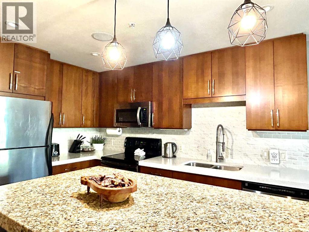 317, 1818 Mountain Ave, Canmore, Alberta  T1W 2W1 - Photo 11 - A2264214