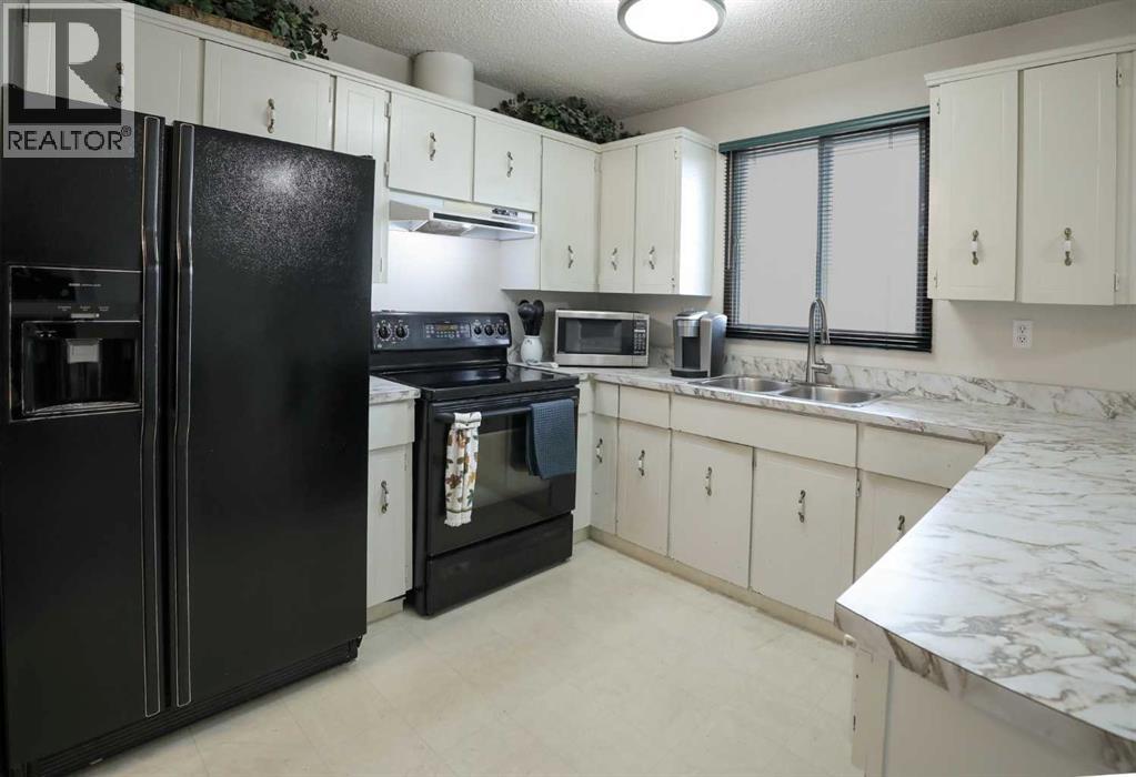 143 Barrett Drive, Red Deer, Alberta  T4R 1H3 - Photo 5 - A2267531